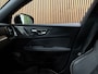Volvo V60 T6 AWD Recharge Plus Dark | Schuifdak | 360 Camera | Harman Kardon | Adaptieve Cruise Control | Stoelverwarming voor+achter | Stuurwielverwarming | Full LED Meesturende koplampen | Pilot Assist | BLIS Dode Hoek Detectie | Elektrische voorstoelen geheugen | R-Design Contour Stoelen met wit stiksel en bies | Zitting verlenging voorstoelen | 19 Inch | Google Infotainment | Keyless Drive | Parkeersensoren voor+achter | Privacy Glass | Elektrisch bedienbare achterklep | DAB Radio | Apple Carplay/Android Auto | Volvo On Call met mobiele App functie | Thunder Grey Metallic |