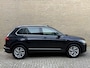 Volkswagen Tiguan 1.4 TSI eHybrid 245pk Elegance Business+ | Panoramadak | Trekhaak wegklapbaar | Virtual cockpit | Adaptieve cruise | Camera | Navigatie | Apple CarPlay | Stoel&stuurverwarming | Keyless | DAB | Sfeerverlichting | IQ-light | Elektrische achterklep | Volledig onderhouden