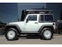 Jeep Wrangler 3.8 V6 HIGH SPORT 4X4 AUT. *UNIEK* | CARPLAY | AIRTOP | FRONTRUNNER | TREKHAAK | CAMERA |