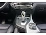 BMW 1-Serie 118i M-Pakket | Automaat | Carplay | Schuifkanteldak | Leer | 118