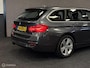 BMW 3-Serie Touring 320i High Executive SPORTLINE / LEDER / AUTOMAAT / TR.HAAK / NAVI / STOELVERW. /
