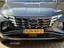 Hyundai Tucson 1.6 T-GDI 265 PHEV Premium Sky 4WD | Panoramadak | Trekhaak afneembaar | Lederen bekleding | Memory | 360 camera | Stoelverwarming&ventilatie | Stuurverwarming | Adaptieve cruise | Navigatie | LED | DAB | Apple CarPlay | Elektrische achterklep | Dealeronderhouden | Fabrieksgarantie