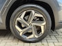 Hyundai Tucson 1.6 T-GDI 265 PHEV Premium Sky 4WD | Panoramadak | Trekhaak afneembaar | Lederen bekleding | Memory | 360 camera | Stoelverwarming&ventilatie | Stuurverwarming | Adaptieve cruise | Navigatie | LED | DAB | Apple CarPlay | Elektrische achterklep | Dealeronderhouden | Fabrieksgarantie