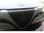 Alfa Romeo Junior 1.2 145PK AUTOMAAT Hybrid IBRIDA TI | TECHNO PACK: (LED MATRIX KOPLAMPEN, DRAADLOZE TELEFOONLADER, DODEHOEK DETECTIE, PARKEERSENSOREN VOOR ACHTER EN ZIJKANT, NAVIGATIE, ELEKTRISCH BEDIENBARE ACHTERKLEP, KEYLESS ENTRY, ADAPTIVE CRUISE CONTROL, ACHTERUITRIJ CAMERA) | PACK TI: (ELEKTRISCH BEDIENBARE BESTUUDERSSTOEL, VERKEERSBORDEN WEERGAVE, GETINTE ACHTERRUITEN, SFEER VERLICHTING, GLANZEND ZWARTE BODYKIT, 10,25" TOUCHSCREEN, LEDEREN STUURWIEL, VERSTELBARE KOFFERVLOER OP 3 NIVEAUS) | 18" LICHTMETALEN VELGEN "FORI" | DRAADLOZE APPLE CARPLAY/ANDROID AUTO | MASSAGE FUNCTIE OP DE BESTUURDERSSTOEL | STOEL VERWARMING | VOORRUIT VERWARMING |