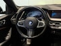 BMW 1-Serie M135i xDrive High Executive Panodak Leder HUD Harman Kardon Camera Carplay Dealer Onderhouden
