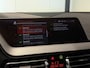 BMW 1-Serie M135i xDrive High Executive Panodak Leder HUD Harman Kardon Camera Carplay Dealer Onderhouden