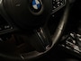 BMW 1-Serie M135i xDrive High Executive Panodak Leder HUD Harman Kardon Camera Carplay Dealer Onderhouden