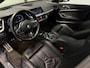 BMW 1-Serie M135i xDrive High Executive Panodak Leder HUD Harman Kardon Camera Carplay Dealer Onderhouden