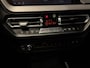 BMW 1-Serie M135i xDrive High Executive Panodak Leder HUD Harman Kardon Camera Carplay Dealer Onderhouden