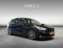 BMW 1-Serie M135i xDrive High Executive Panodak Leder HUD Harman Kardon Camera Carplay Dealer Onderhouden