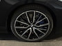 BMW 1-Serie M135i xDrive High Executive Panodak Leder HUD Harman Kardon Camera Carplay Dealer Onderhouden