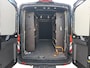 Ford Transit 350 2.0 TDCI L3H2 Trail 165 pk handgeschakeld | BPM VRIJ | Adaptive Cruise control | Navigatiesysteem | Raptor Gril | Zwarte treeplanken | LM velgen gloss black | Houten kasten links en rechts | Dakdragers met laddersysteem