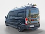 Ford Transit 350 2.0 TDCI L3H2 Trail 165 pk handgeschakeld | BPM VRIJ | Adaptive Cruise control | Navigatiesysteem | Raptor Gril | Zwarte treeplanken | LM velgen gloss black | Houten kasten links en rechts | Dakdragers met laddersysteem