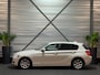 BMW 1-Serie 114i EDE High Executive XENON/CRUISE/PDC/CLIMATE/STOELVERW/MULTIMEDIA/RIJMODUS/GARANTIE