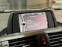 BMW 1-Serie 114i EDE High Executive XENON/CRUISE/PDC/CLIMATE/STOELVERW/MULTIMEDIA/RIJMODUS/GARANTIE