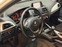 BMW 1-Serie 114i EDE High Executive XENON/CRUISE/PDC/CLIMATE/STOELVERW/MULTIMEDIA/RIJMODUS/GARANTIE