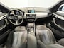 BMW X1 sDrive20i Executive Edition Panoramadak | Trekhaak | Navigatie/Android/Apple Carplay | LM Velgen | Voorstoelen Verwarmd | Achteruitrijcamera | Cruise Control |