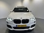 BMW X1 sDrive20i Executive Edition Panoramadak | Trekhaak | Navigatie/Android/Apple Carplay | LM Velgen | Voorstoelen Verwarmd | Achteruitrijcamera | Cruise Control |