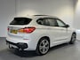 BMW X1 sDrive20i Executive Edition Panoramadak | Trekhaak | Navigatie/Android/Apple Carplay | LM Velgen | Voorstoelen Verwarmd | Achteruitrijcamera | Cruise Control |