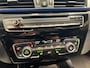BMW X1 sDrive20i Executive Edition Panoramadak | Trekhaak | Navigatie/Android/Apple Carplay | LM Velgen | Voorstoelen Verwarmd | Achteruitrijcamera | Cruise Control |