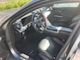 Mercedes-Benz C-klasse 300 e AMG Line | Magno | Panoramadak | Stoelverwarming | Adaptive Cruise Control | Dodehoekdetectie | Head-Up Display | Memory Seat | 360 Camera | Keyless | Ambiance Verlichting | Navigatie | Apple Carplay