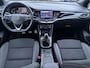 Opel Astra Sports Tourer 1.2 Elegance ✓110pk✓Camera✓Carplay✓Navi✓Halfleder✓Keyless✓Trekhaak✓Pdc V+A✓Clima✓Cruise✓Elekt Stoel✓Recent beurt gehad✓Dodehoeksensor✓Rijstrooksensor✓Lm velgen✓N.A.P✓Apk tot 11-2027