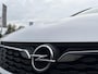 Opel Astra Sports Tourer 1.2 Elegance ✓110pk✓Camera✓Carplay✓Navi✓Halfleder✓Keyless✓Trekhaak✓Pdc V+A✓Clima✓Cruise✓Elekt Stoel✓Recent beurt gehad✓Dodehoeksensor✓Rijstrooksensor✓Lm velgen✓N.A.P✓Apk tot 11-2027