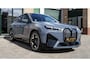 BMW iX xDrive50 112 kWh M-Sport |Individual Storm Bay|B&W Diamond|Massage|Laser|Trekhaak|Sky Lounge|