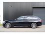 BMW 5-Serie Touring 530i High Executive M | M Pakket | Schuif/kanteldak | Head-Up display | 20 inch | Adaptieve cruise control | Luchtvering