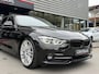 BMW 3-Serie 330e High Exe Leder|Navi|252PK|PDC|HUD