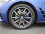 BMW i4 eDrive35 M-Sport 70 kWh | Panoramadak | Oyster Leder | Stoelverwarming | Apple Carplay / Android Auto | Climate Control | Adaptive Cruise Control | Camera | Virtual Cockpit | Lichtmetalen M-Sport Velgen | Elektrische Achterklep |