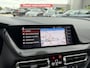 BMW 1-Serie 118i Sport Line Trekhaak LED PDC Carplay DAB 18 Inch Sportstoelen