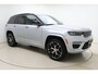 Jeep Grand Cherokee 2.0 Summit Reserve 4xe 380 PK | Trekhaak | 2332 KG Trekgewicht | Lederen bekleding | Panoramisch schuifdak | Massage stoelen | Keyless