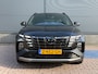 Hyundai Tucson 1.6 T-GDI PHEV N Line Sky 4WD / Panoramadak / 360° camera / Adaptive cruise control / Stoelventilatie / Stoelverwarming voor + achter / Stuurwielverwarming / Elektrisch verstelbare voorstoelen / Elektrische achterklep / Keyless entry & start / Apple CarPlay & Android Auto / Navigatie / Draadloos telefoonladen / LED verlichting / 19” N Line velgen / Dodehoekdetectie / Parkeersensoren voor + achter / Climate control / Privacy glass / N Line interieur & exterieur