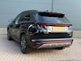Hyundai Tucson 1.6 T-GDI PHEV N Line Sky 4WD / Panoramadak / 360° camera / Adaptive cruise control / Stoelventilatie / Stoelverwarming voor + achter / Stuurwielverwarming / Elektrisch verstelbare voorstoelen / Elektrische achterklep / Keyless entry & start / Apple CarPlay & Android Auto / Navigatie / Draadloos telefoonladen / LED verlichting / 19” N Line velgen / Dodehoekdetectie / Parkeersensoren voor + achter / Climate control / Privacy glass / N Line interieur & exterieur