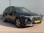 Hyundai Tucson 1.6 T-GDI PHEV N Line Sky 4WD / Panoramadak / 360° camera / Adaptive cruise control / Stoelventilatie / Stoelverwarming voor + achter / Stuurwielverwarming / Elektrisch verstelbare voorstoelen / Elektrische achterklep / Keyless entry & start / Apple CarPlay & Android Auto / Navigatie / Draadloos telefoonladen / LED verlichting / 19” N Line velgen / Dodehoekdetectie / Parkeersensoren voor + achter / Climate control / Privacy glass / N Line interieur & exterieur