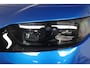 Ford Capri Premium Extended Range AWD 79 kWh | SOH 96% | Stuur/stoel Verwarming | 360 Camera | Adaptieve Cruise | Elektr trekhaak | Massage Zetels | Warmtepomp | Panoramadak