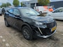 Peugeot e-2008 EV Active Pack 50 kWh | Fase 3 laden | SOH 89,88% | Navi by app | Lichtmetaal | Parkeersensoren | Bluetooth | 1e eigenaar |