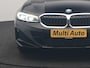 BMW 3-Serie Touring 320e Luxury Line Facelift PHEV Dealer O.H. | Trekhaak Af Fabriek | Panodak | Head Up | Adaptive Cruise | 360 Camera | Lederen Sportstoelen Verwarmd | Sfeerverlichting | Apple Carplay | Keyless | Widescreen Navi | DAB | Plug In Hybrid