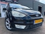 Ford Galaxy 2.0 TDCi Ghia 7 pers in automaat en leer met parkeersensoren en navigatie en bluetooth telefoon en airco