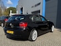 BMW 1-Serie 116i EDE Business Sport | Cruise | Navi | Trekhaak | 18" | Xenon