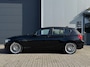 BMW 1-Serie 116i EDE Business Sport | Cruise | Navi | Trekhaak | 18" | Xenon