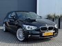 BMW 1-Serie 116i EDE Business Sport | Cruise | Navi | Trekhaak | 18" | Xenon