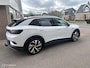 Volkswagen ID.4 First 77 kWh STUUR/STOELVERWARMING WEGDRAAIBARE TREKHAAK CARPLAY SFEERVERLICHTING CAMERA ACCU GARANTIE!!