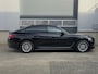 BMW i4 eDrive40 84 kWh Trekhaak, ACC, Zwarte hemel, Elektr stoelen, HUD, DAB