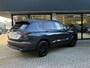 Mitsubishi Outlander 2.4 PHEV Black Edition NIEUW UIT VOORRAAD LEVERBAAR | Lederen bekleding | Stoelmassage | Climate Control voor- en achter | Stoelverwarming voor- en achter | Parkeersensoren voor- en achter | Adaptieve Cruise Control | Navigatiesysteem | 8 jaar fabrieksgarantie
