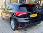 Ford Focus 1.0 Hybrid Titanium X | AGR COMFORTSTOELEN| DODEHOEK DETECTIE| NAVIGATIE + APPLE CARPLAY/ANDROID AUTO| KEYLESS ENTRY & START| CAMERA + PARKEERSENSOREN| LED KOPLAMPEN| DRAADLOZE TELEFOONLADER| BROEKHUIS ONDERHOUDEN|