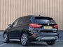 BMW X1 sDrive20i Orange Edition III | Dealer Onderhouden | Origineel Nederlands | NAP | Panoramadak | Harman Kardon | Rijmodus Regeling |  Camera Achter |