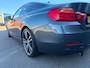 BMW 4-Serie Coupé 420i High Executive M-PAKKET SCHUIFDAK/HARMAN/KARDON/LEDER