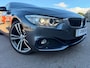 BMW 4-Serie Coupé 420i High Executive M-PAKKET SCHUIFDAK/HARMAN/KARDON/LEDER